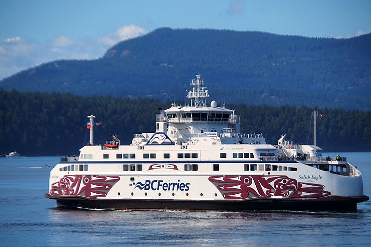 The BC Ferries vessel Salish Eagle, adorned with artwork by Indigenous artist John Marston, crossing the Gulf Islands.