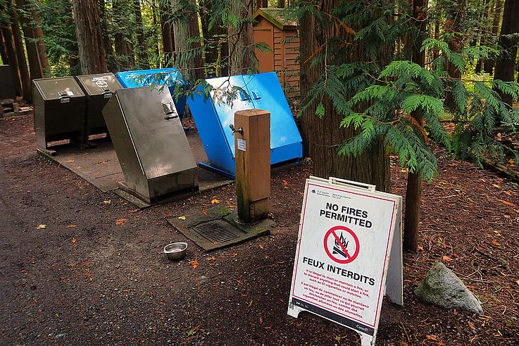 No-fire sign and waste collection points in the Gulf Islands National Park Reserve.