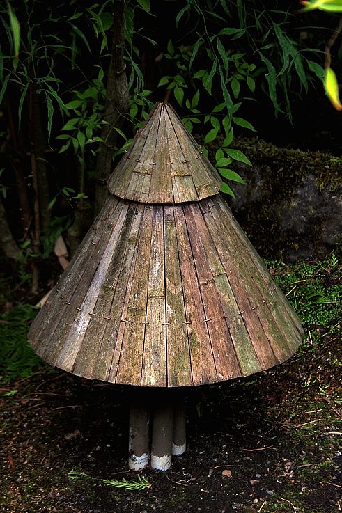 Wooden lid of a Japanese lantern at Butchart Gardens.