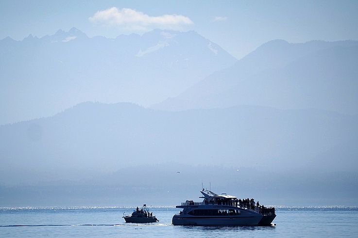 Puget Sound Express boat off Metchosin, with the Olympic Mountains in the background.