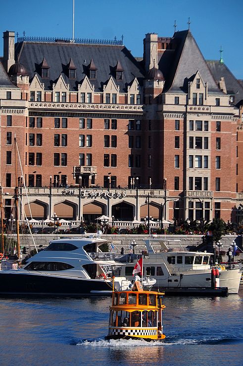 Water taxi in Victoria's Inner Harbour in front of the Fairmont Empress Hotel.