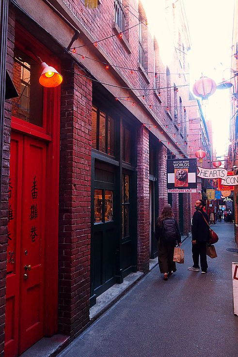 Red door and lanterns in Fan Tan Alley, Chinatown district in Victoria.
