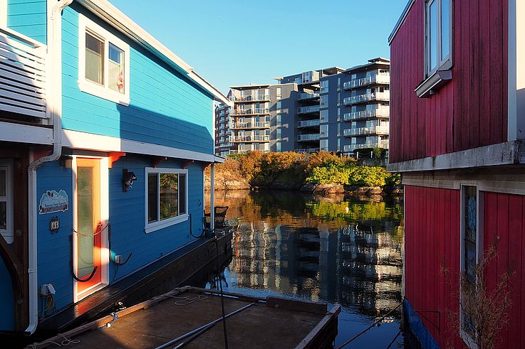 Colorful floating houses at Fisherman's Wharf in Victoria.