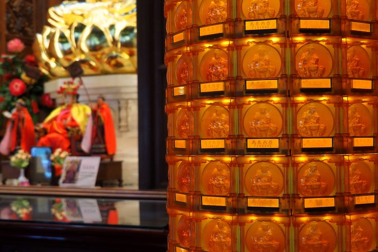 Illuminated Buddhist reliefs at Kek Lok Si Temple, George Town.