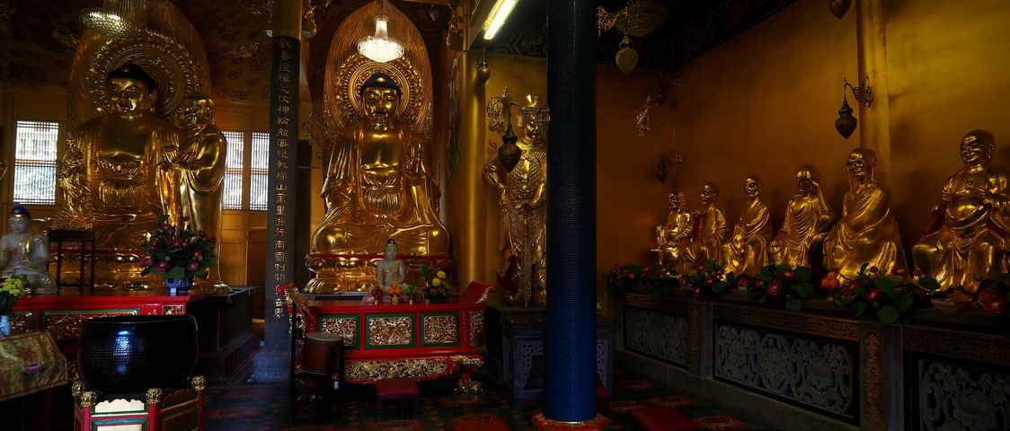 Multiple golden Buddha statues in Kek Lok Si Temple in George Town.