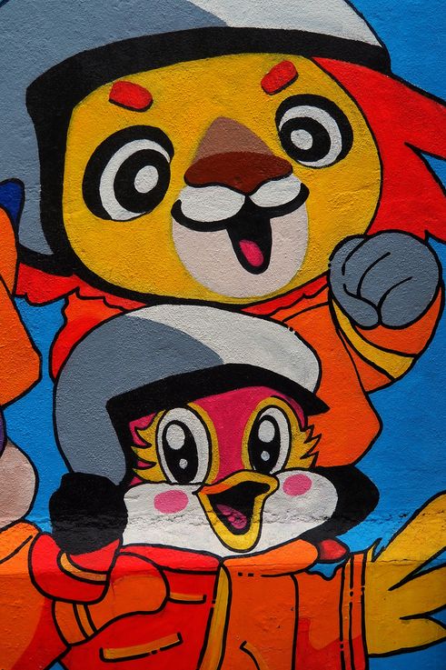 Cartoon firefighter mural in Little India, George Town.