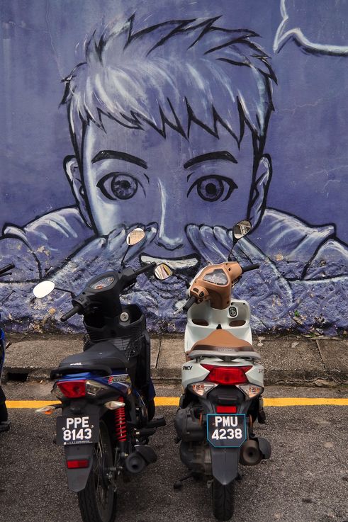 Mural 'Boy on a Motorbike' in George Town.