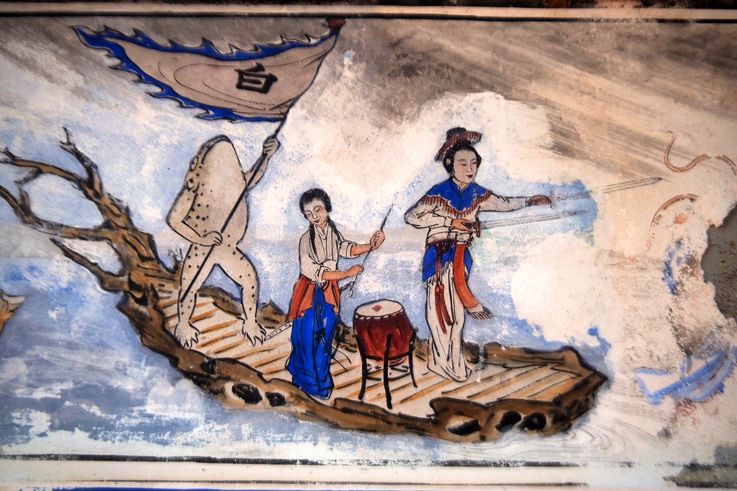 Mural del templo Cheng Hoon Teng de Melaka: una embarcación con una figura de rana y personajes.