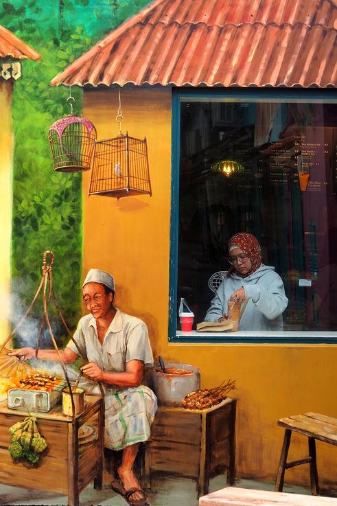 Mural by Yip Yew Chong on Muscat Street, local life scene with a satay vendor and a shop interior.