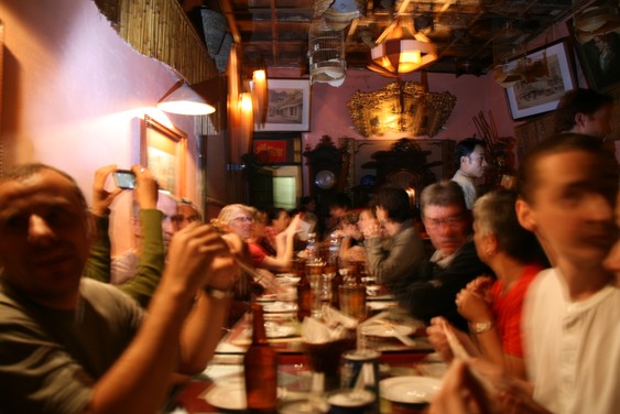At the restaurant under the birdcages in Hanoi