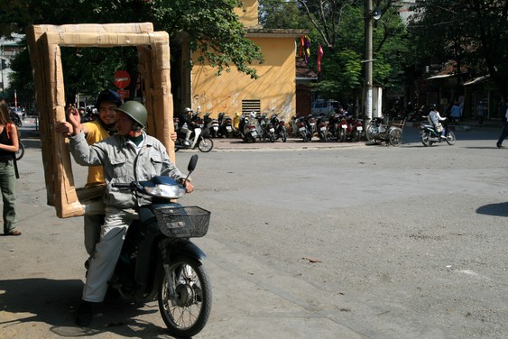 Transporting window frames in Hanoi...