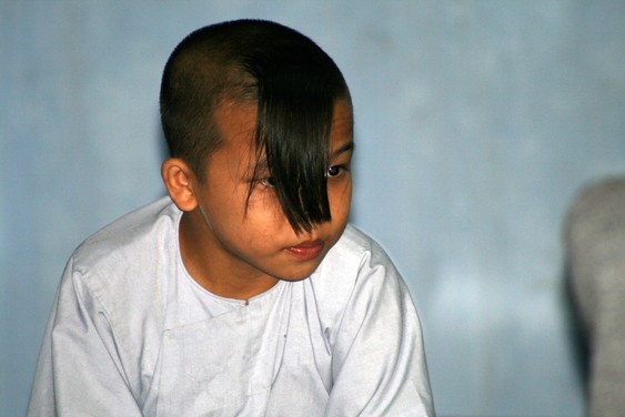 Young monk in Thien Mu Pagoda in Hue